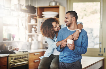 love, coffee and happy couple in kitchen, morning hug in home with smile, hugging and healthy relati