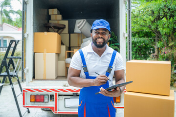 Poster - Moving service workers unloading boxes and checking list,After unloading boxes from truck before sending them to the homeowner.