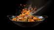 Super Slow Motion Shot of Wok Pan with Flying Ingredients in the Air and Fire Flames.