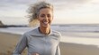 © GustavsMD - Attractive fit woman running on Santa Monica Beach boardwalk pacific ocean in background. Generative AI.