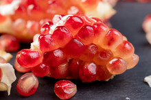 Peeled Red Ripe Pomegranate With Juicy Grains