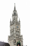 Fototapeta Big Ben - Tower of the famous Munich Townhall  in the old town of Munich