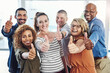 © Tamani Chithambo/peopleimages.com - Yes, thumbs up portrait and business people with diversity, winner and thank you like sign of staff. Office, happiness and success of worker group with support, teamwork and motivation for company
