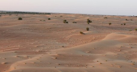 Wall Mural - Sunrise over the Arabian Rub' al Khali Empty Quarter desert near Dubai in the United Arab Emirates