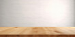 © IndigoElf - Wooden empty table template, desk mock-up. White background wall, wooden showcase stage for product. Generative AI professional photo imitation.