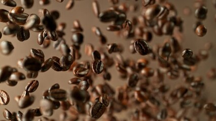 Aufkleber - Super slow motion of rotating coffee beans on black background. Filmed on high speed cinema camera, 1000 fps placed on high speed cine bot.  Camera moving up with rotation. Speed ramp effect.