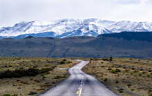 Highway Leading To Snow Covered Mountains, Torres Del Paine National Park, Chile