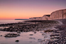 The Seven Sisters White Chalk Cliffs At Sunset, Birling Gap, South Downs National Park, East Sussex, England, United Kingdom