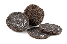 Black Truffles With Slices On White Background.