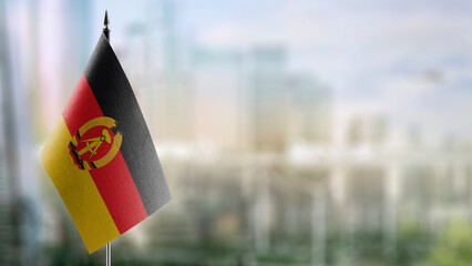 Poster - A small GDR flag on an abstract blurry background