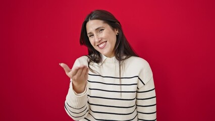 Poster - Young beautiful hispanic woman smiling confident blowing kiss over isolated red background