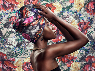 Fashion, beauty and black woman with scarf on flower background with glamour, cosmetics and makeup. Floral pattern, designer and face of female person in exotic jewelry, African style and head turban