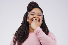 Portrait, Funny Face And Finger On Nose With A Black Woman In Studio On A Gray Background Looking Silly Or Goofy. Comedy, Comic And Nostril With A Crazy Young Female Person Joking For Fun Or Humor