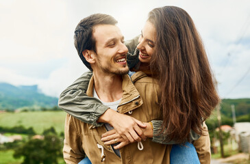 Poster - Date, love and piggyback with couple in nature for happy, smile and bonding. Happiness, relax and care with man carrying woman in countryside field for spring, anniversary vacation and travel