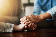 Holding Hands, Senior Couple And Life Insurance Support With Kindness In A House. Home, Love And Elderly People With Empathy, Hope And Trust With Solidarity For Grief Care And Marriage Together