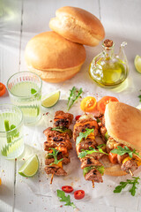 Wall Mural - Grilled shashlik with bun vegetables and lemonade.