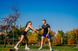 © qunica.com - Beautiful fit couple having fun in the park while exercising
