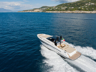 Wall Mural - Aerial view of a luxury yacht in the mediterranean sea. napoli coast