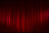 Fototapeta Morze - Theatrical stage curtain red in the light of spotlights.