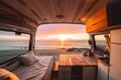 © VictorCanalesStudio - Sunset seen from back of camper van with beach landscape. Concept of nature and having freedom in holiday