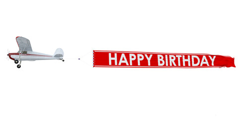 Canvas Print - Flying plane with a happy birthday banner