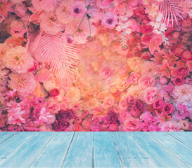 Wall Mural - light bulb over pink rose and carnation flowers bouquet background.