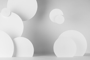 Poster - white soft light abstract stage with pattern of circles fly as decor in urban geometric style, scene