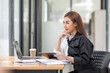 © David - Business Asian woman working at office with documents on his desk, doing planning analyzing the financial report, business plan investment, finance analysis concept