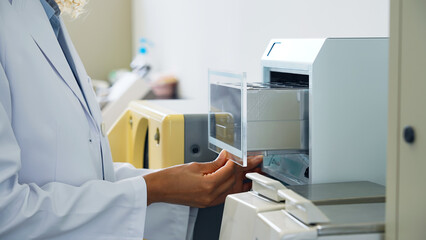 Poster - Group of researcher using experimental equipment.