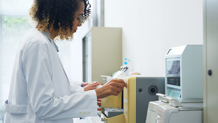 Poster - Group of researcher using experimental equipment.