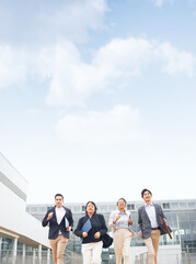 Aufkleber - Group of multinational people running on street. International business.