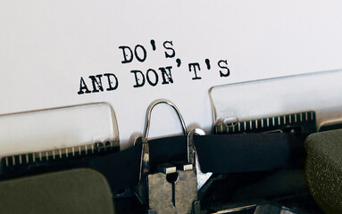 Fototapete - Text dos and donts typed on retro typewriter