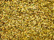Gold glitter texture sparkling shiny wrapping paper background for Christmas, xmas, holiday seasonal wallpaper decoration.