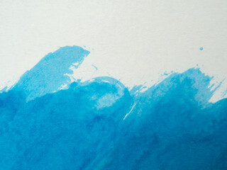 Wall Mural - Blue paint and splash and white background, copy space above.