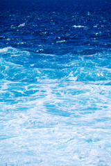 Wall Mural - the sea as a background. waves and sea foam. water color gradient. nature photo for design and backg