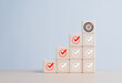 © RerF - Checklist, Complete Task list. Goals achievement or enterprise objective target for company success. To do list. Check mark and dartboard from top of wooden cube stacks. Keys for success in business.