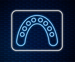 Wall Mural - Glowing neon line Mouth guard boxer icon isolated on brick wall background. Vector