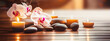 Beautiful asian spa composition with candles, orchids and massage hot stones on massage table on blurred wellness center background. Beauty spa treatment and relax concept. Banner size. Generative ai