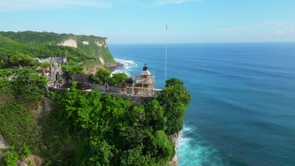Wall Mural - Aerial shot of Uluwatu temple. Uluwatu Temple is a Balinese Hindu sea temple located in Uluwatu.