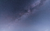 Fototapeta Na sufit - Beautiful starry night. Bright Milky Way galaxy sky. Astronomical background.