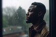 © ruang - black man standing near window