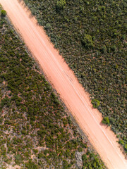 Wall Mural - Aerial view of remote desert dirt road in the outback of Australia. Indian Ocean Drive, Western Australia, Australia. 