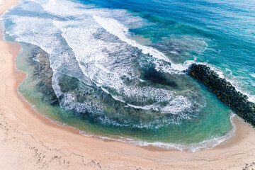 Wall Mural - Beautiful view of the beach breakwater cove