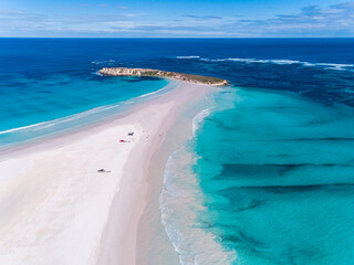 Wall Mural - Summer seascape beautiful waves on the beach, blue sea water in sunny day. Top view from drone. Sea aerial view, amazing tropical beach background. Beautiful bright sea waves splashing