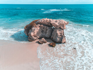 Wall Mural - aerial seascape view of the beach and rock in the shallow water