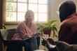© Westend61 - Senior psychologist advising patient in therapy session at office