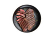 Barbecue denver strip beef meat steak on a plate.  Isolated, transparent background.