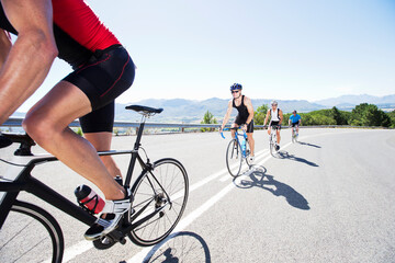 Wall Mural - Cyclists in race on rural road