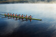 © KOTO - Rowing crew rowing scull on lake