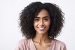 © Pictures Paradise - Portrait of a beautiful young afro american model looking at camera. With afro hair and clean healthy facial skin. Skin care. Copy space.